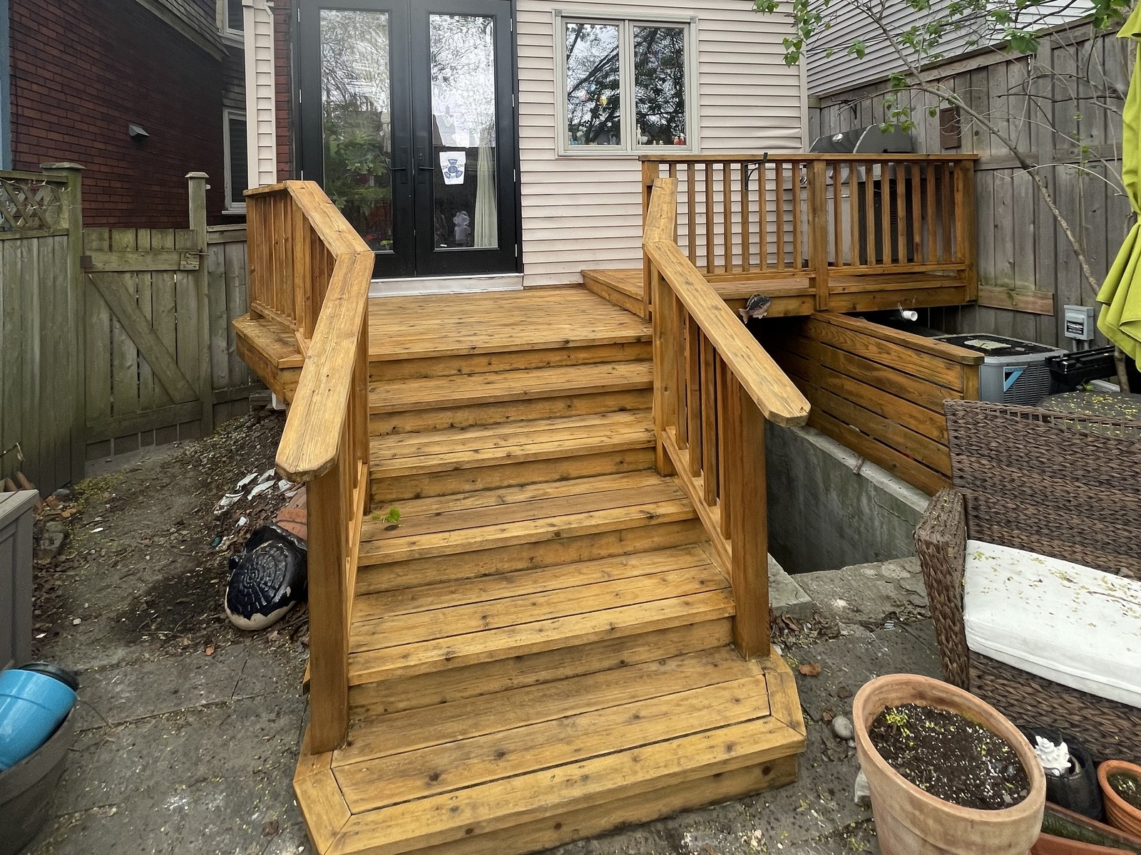 Backyard deck freshly stained and restored