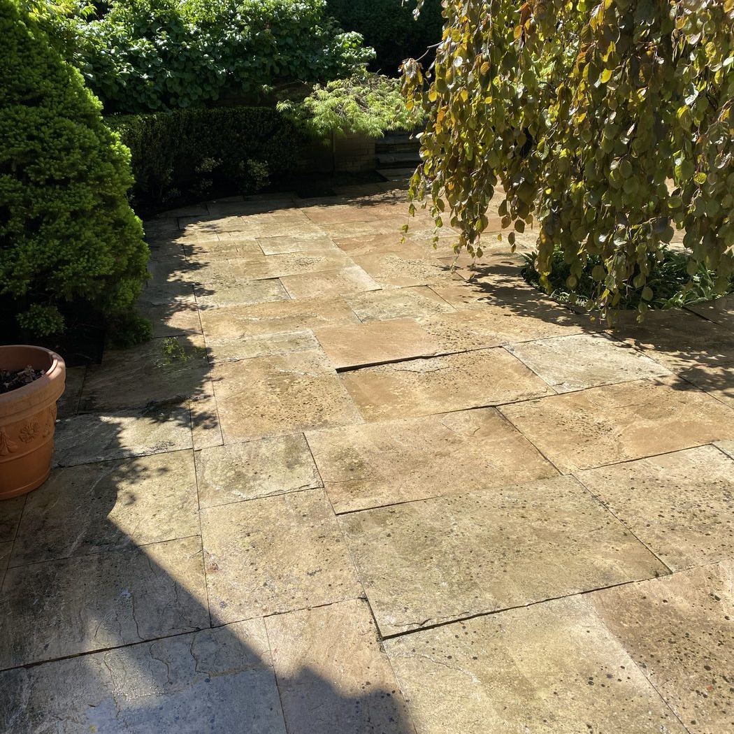 Flagstone patio spotless after pressure washing
