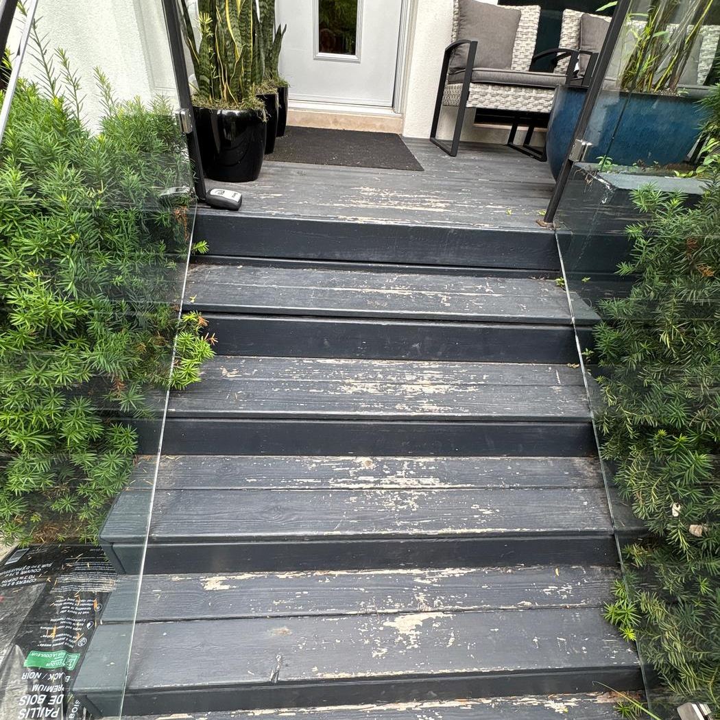 Worn faded front entry steps before refinishing